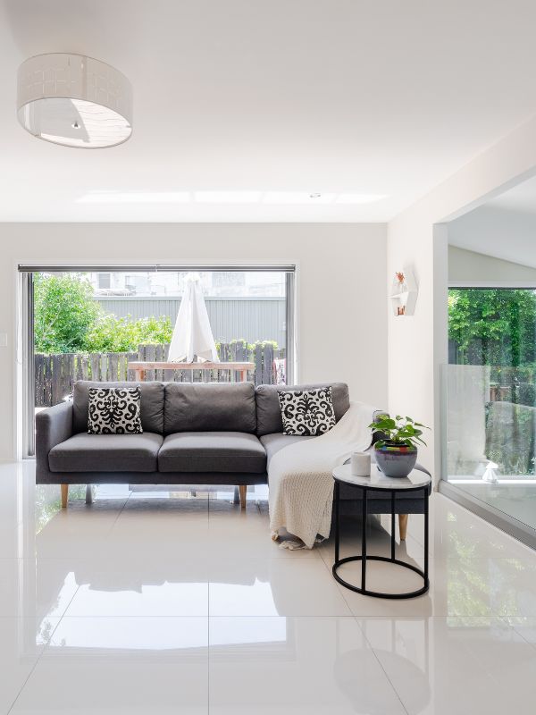 Bright modern living room showcasing the results of a home built through a construction loan with Elevate Financial.